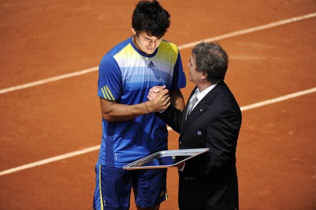 08.06.2013 Paris, France. Christian Garin of Chile receives the Winners Trophy from Jean-Pierre Dartevelle, Vice-President of the FFT after the match in the Junior Boys Final of the French Open from Roland Garros. Garin of Chile won the final by a score of 6-4 and 6-1. xDavidxEmmx  ActionPlus11416640