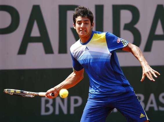 French Open 2013, Roland Garros,Paris,ITF Grand Slam Tennis Tournament, Junioren Wettbewerb, Cristian Garin (CHI),Aktion,Einzelbild,Halbkoerper,Querformat,