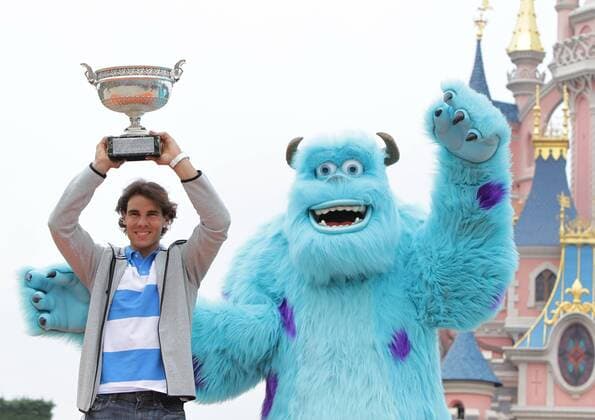 PARIS, June 10, 2013 -- Spain s Rafael Nadal poses with the trophy at the Disneyland in Paris June 10, 2013. 
