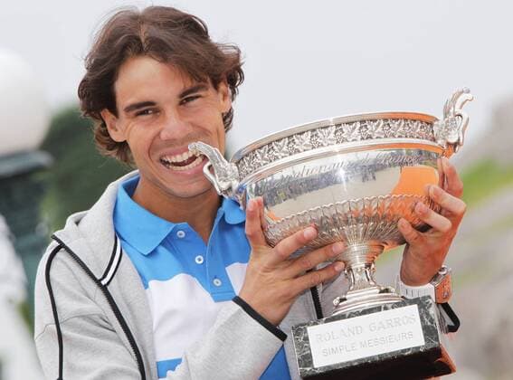 PARIS, June 10, 2013 -- Spain s Rafael Nadal poses with the trophy at the Disneyland in Paris June 10, 2013. 