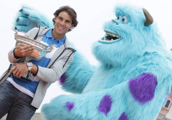 PARIS, June 10, 2013 -- Spain s Rafael Nadal poses with the trophy at the Disneyland in Paris June 10, 2013. 