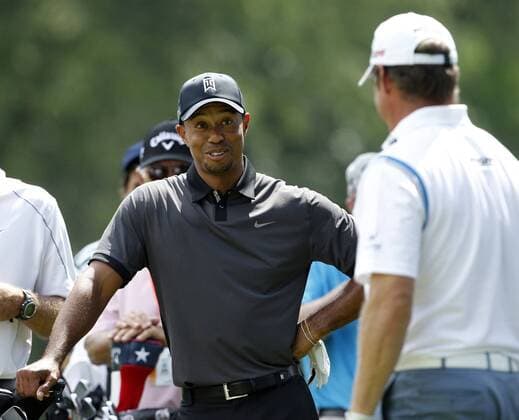 June 11, 2013 - Ardmore, PA, USA - Tiger Woods chats with Lee Westwood during a practice day for the U.S. Open golf championship at Merion Golf Club in Ardmore, Pennsylvania, Tuesday, June 11, 2013. U.S. Open - ZUMAm67