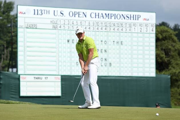 June 11 2013: Jamie Donaldson putts on the 18th green in front of the large scoreboard during tuesday s practice round at the 2013 U.S. Open hosted by Merion Golf Club in Ardmore, PA. GOLF: JUN 11 PGA Golf Herren - U.S. Open - Tuesday Practice Round Icon20326004 EDITORIAL USE ONLY