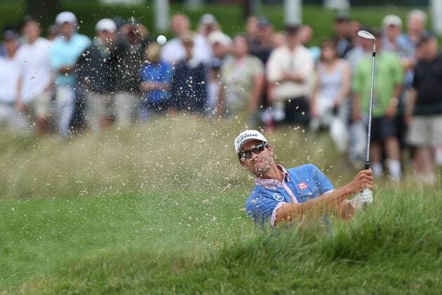 June 13 2013: Adam Scott hits out of the sand bunker during the first round at the 2013 U.S. Open hosted by Merion Golf Club in Ardmore, PA. GOLF: JUN 13 PGA Golf Herren - U.S. Open - First Round Icon1306131021 EDITORIAL USE ONLY