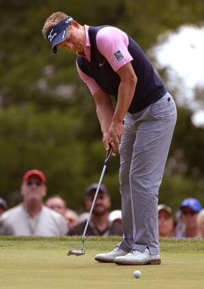 Luke Donald putts on the 15th green during the second round 113th U.S. Open Championship at Merion Golf Club in Ardmore, Pennsylvania on June 14, 2013.  PHI20130614315