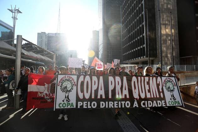 Demonstrators protest against millionaire public spending for the FIFA Confederations Cup Brazil 2013 and the World Cup Brazil 2014, in Sao Paulo, Brazil, on June 14, 2013. (Xinhua Rahel Patrasso) (itm) (sp) (SP)BRAZIL-SAO PAULO-CONFEDERATIONS-PROTEST 