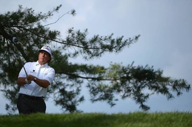 Phil Mickelson watches his drive off of the 5th tee box during the second round 113th USA Open Championship at Merion Golf Club in Ardmore, Pennsylvania on June 14, 2013.  PHI20130614331
