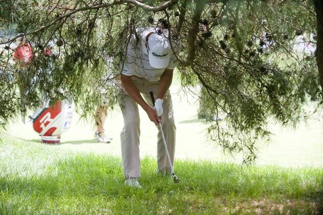 June 15, 2013 - New York, U.S. - June 15 2013: Shawn Stefani, of USA, retrieves a hit ball underneath a tree on the 2nd far way stretch during the third round at the 113th U.S. Open National Championship at the Merion Golf Club in Ardmore, Pa. Golf 2013: US Open JUN 15 - ZUMAcw2