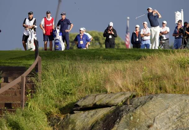 Justin Rose hits a tee shot on the 17th hole in the final round at the 113th U.S. Open at Merion Golf Club in Ardmore, Pennsylvania on June 16, 2013. Justin Rose won the 2013 U.S. Open with a score of 1 over par and Phil Mickelson finished in a tie for second place at 3 over par.  PHI20130616133