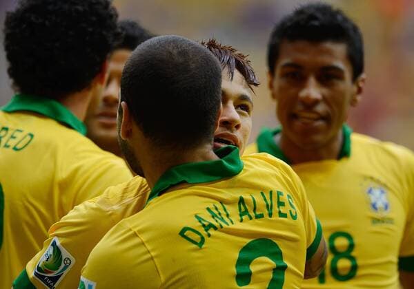 Jun 15, 2013 - Brasilia, Brazil - NEYMAR, hugs DANI ALVES, after your first score during the Confederations Cup, match between Brazil vs Japan at Brasilia National Stadium. Soccer 2013 - Brazil vs Japan - Confederations Cup  - ZUMAm11