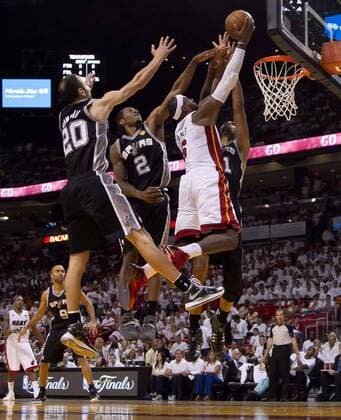 June 18, 2013 - Miami, FL, USA - The Miami Heat s LeBron James (6) drives the lane past the San Antonio Spurs Manu Ginobili (20), Kawhi Leonard (2) and Tim Duncan in Game 6 of the NBA Basketball Herren USA Finals on Tuesday, June 18, 2013, at the AmericanAirlines Arena in Miami, Florida. Miami won, 103-100, in overtime to force a Game 7. Game 6 - NBA Basketball Herren USA Finals - ZUMAm67