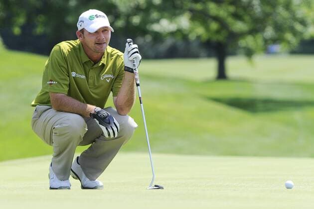 June 22, 2013 - Cromwell, Connecticut, USA - Jun 22, 2013 - Cromwell, Connecticut, U.S. - Tommy Gainey sizes up his putt on the 4th green during the third round of the PGA Golf Herren Travelers Championship held at TPC River Highland in Cromwell Connecticut. Gainey bogeyed the hole ending the day tied for 7th place. Eric Canha CSM PGA Golf Herren 2013: Travelers Championship JUN 22 - ZUMAc04