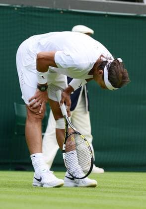 Tennis - 2013 Wimbledon Championships - Men s Singles First Round on Court 1. Rafael Nadal (Spain) on his way to defeat 