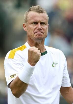 Lleyton Hewitt of Australia celebrates during the first round of the men s singles at the Wimbledon Lawn Tennis Championships in the All England Lawn Tennis and Croquet Club in London, Britain, on June 24, 2013. (Xinhua Tang Shi) (SP)BRITAIN-LONDON-TENNIS-WIMBLEDON 