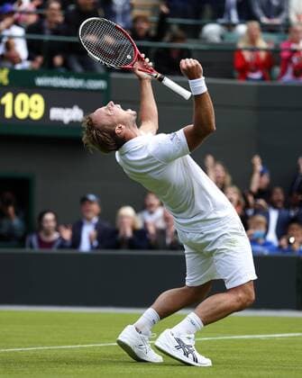 Steve Darcis of Belgium celebrates after the first round of the men s singles at the Wimbledon Lawn Tennis Championships in the All England Lawn Tennis and Croquet Club in London, Britain, on June 24, 2013. (Xinhua Wang Lili) (SP)BRITAIN-LONDON-TENNIS-WIMBLEDON 