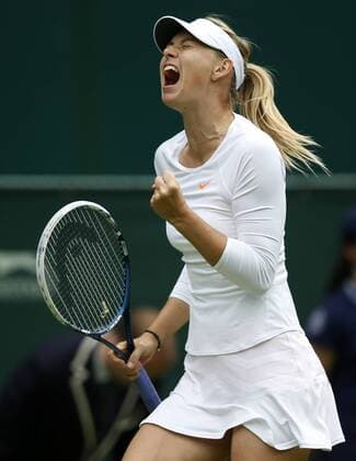 Maria Sharapova of Russia celebrates during the first round of the women s singles at the Wimbledon Lawn Tennis Championships in the All England Lawn Tennis and Croquet Club in London, Britain, on June 24, 2013. (Xinhua Wang Lili) (SP)BRITAIN-LONDON-TENNIS-WIMBLEDON 