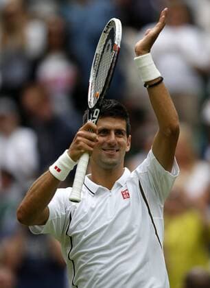Novak Djokovic of Serbia greets spectators after the first round of the men s singles on day 2 of the Wimbledon Lawn Tennis Championships at the All England Lawn Tennis and Croquet Club in London, Britain, on June 25, 2013. 