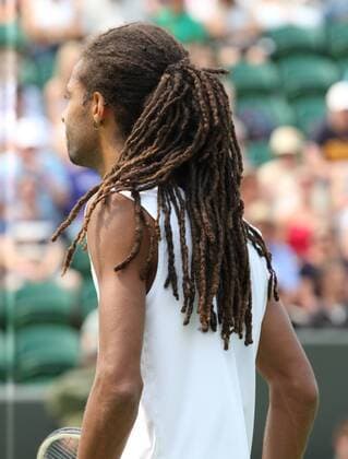 26.06.2013. Wimbledon, London, England. Day three of the The Wimbledon Tennis Championships 2013 held at The All England Lawn Tennis Club, London, England, UK. Dustin Brown (GER) xKieranxGalvinx  ActionPlus11423220