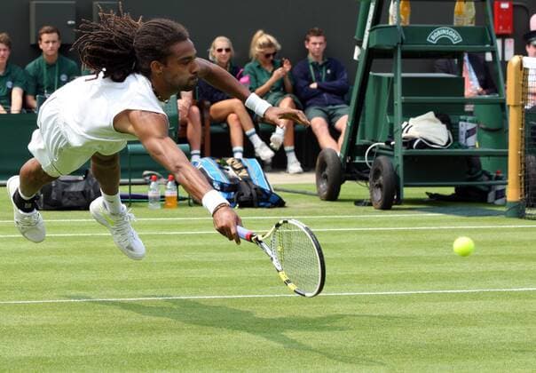 26.06.2013. Wimbledon, London, England. Day three of the The Wimbledon Tennis Championships 2013 held at The All England Lawn Tennis Club, London, England, UK. Dustin Brown (GER) xKieranxGalvinx  ActionPlus11423214