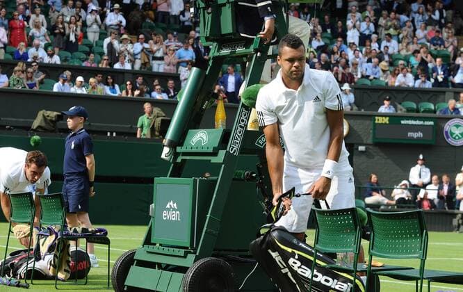 Tennis - 2013 Wimbledon Championships - Mens Singles second Round Wilfried Tsonga against Emests Gulbis on Centre Court Wilfried Tsonga - France retires injured 