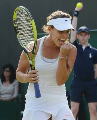Tennis - 2013 Wimbledon Championships - Ladies Singles second Round on Court 2. Michelle Larcher de Brito - Portugal celebrates on her way to victory 