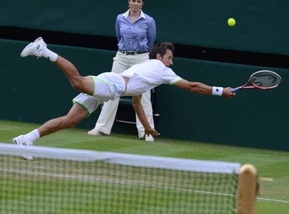 Tennis - 2013 Wimbledon Championships - Mens Singles Sergiy Stakhovsky on Centre Court Sergiy Stakhovsky - Ukraine 