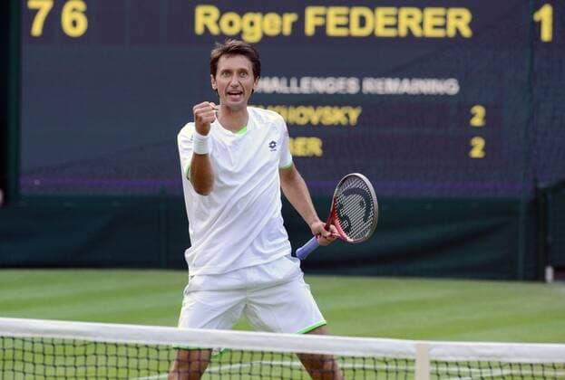 Tennis - 2013 Wimbledon Championships - Mens Singles second Round on Centre Court Sergiy Stakhovsky - Ukraine celebrates the 3rd set 