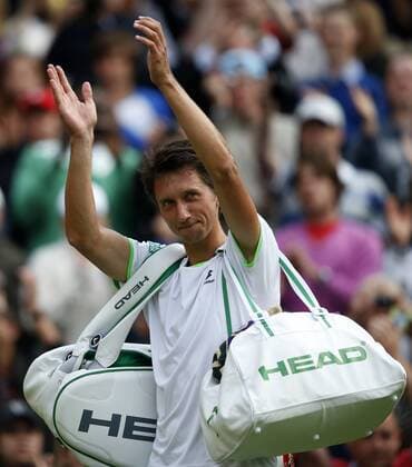 Sergiy Stakhovsky of Ukraine greets spectators after the second round of the men s singles on day 3 of the Wimbledon Lawn Tennis Championships at the All England Lawn Tennis and Croquet Club in London, Britain, on June 26, 2013. (Xinhua Wang Lili) (SP)BRITAIN-LONDON-TENNIS-WIMBLEDON-DAY 3 