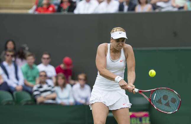 Tennis: Wimbledon Championship 2013, Germany s Sabine Lisicki returns during their second round women s singles match on day four of the 2013 Wimbledon Championships tennis tournament at the All England Club in Wimbledon, southwest London, on June 27, 2013. xKirstenxHolstx xHOCHxZWEIx