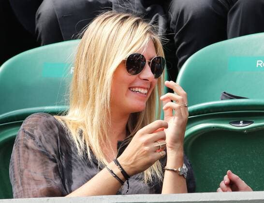 Maria Sharapova sits in the stands in Court 3 at the Wimbledon Tennis Championships, Thursday, 27th June 2013 Picture by StephenxLock i-Images StephenxLockx xi-Images  IIM-0153-0021