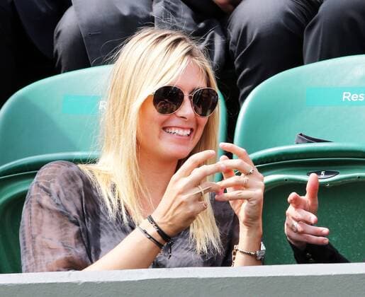 Maria Sharapova sits in the stands in Court 3 at the Wimbledon Tennis Championships, Thursday, 27th June 2013 Picture by StephenxLock i-Images StephenxLockx xi-Images  IIM-0153-0024