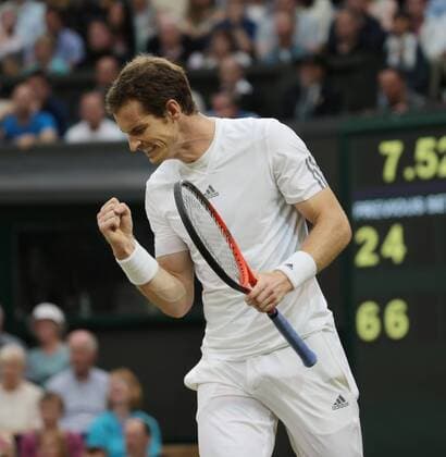 Great Britain s Andy Murray reacts after winning the second set in his match on day five of the 2013 Wimbledon Championships in London on June 28, 2013.  LON2013062831