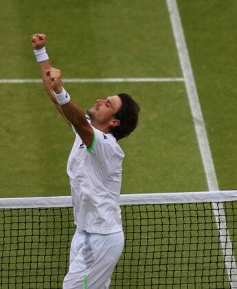 David Ferrer of Spain celebrates after the second round of men s singles on day 5 of the Wimbledon Lawn Tennis Championships at the All England Lawn Tennis and Croquet Club in London, Britain, on June 28, 2013. (Xinhua Yin Gang) BRITAIN-LONDON-TENNIS-WIMBLEDON-DAY 5 