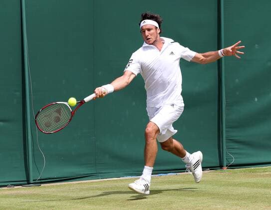 29.06.2013. Wimbledon, London, England. Day Six of the The Wimbledon Tennis Championships 2013 held at The All England Lawn Tennis and Croquet Club, London, England, UK. Juan Monaco (ARG) xKieranxGalvinx  ActionPlus11424213