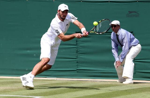 29.06.2013. Wimbledon, London, England. Day Six of the The Wimbledon Tennis Championships 2013 held at The All England Lawn Tennis and Croquet Club, London, England, UK. Viktor Troicki (SRB) xKieranxGalvinx  ActionPlus11424218