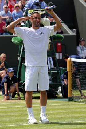 29.06.2013. Wimbledon, London, England. Day Six of the The Wimbledon Tennis Championships 2013 held at The All England Lawn Tennis and Croquet Club, London, England, UK. Mikhail Youzhny ( RUS) celebrates his win xKieranxGalvinx  ActionPlus11424413