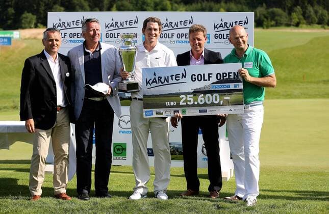 GOLF - Kaernten Golf Open 2013 ST.GEORGEN AM LAENGSEE,AUSTRIA,30.JUN.13 - DIVERS, GOLF - European Challenge Tour, Kaernten Golf Open, GC St. Veit Laengsee, Siegerehrung. Bild zeigt Meinhard Aichner (Praesident Golfclub St. Veit-Laengsee), Guenther Kerle (Mazda Austria), Dylan Frittelli (RSA), Peter Hofstaetter (Promoter) und Christian Kresse (Kaernten Werbung). Keywords: Pokal. 