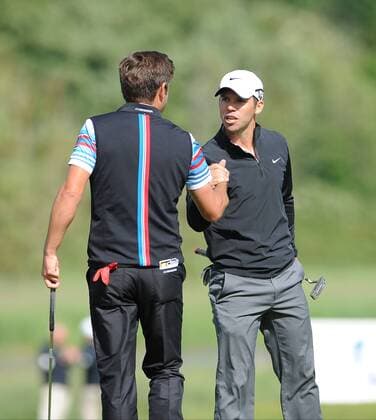 30.06.2013 Maynooth, Ireland. Paul Casey, tournament winner, and Robert Rock, runner-up shake hands after completing the final round of the Irish Open from Carton House Golf Club. xTommyxGrealyx  ActionPlus131012