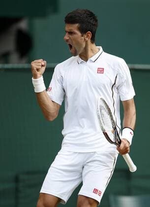 Novak Djokovic of Serbia celebrates during the fourth round of men s singles on day 7 of the Wimbledon Lawn Tennis Championships at the All England Lawn Tennis and Croquet Club in London, Britain on July 1, 2013. (Xinhua Wang Lili) (SP)BRITAIN-LONDON-TENNIS-WIMBLEDON-DAY 7 