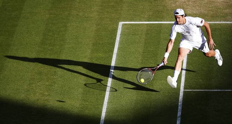 Tommy Haas of Germany hits a return during the fourth round of men s singles on day 7 of the Wimbledon Lawn Tennis Championships at the All England Lawn Tennis and Croquet Club in London, Britain on July 1, 2013. (Xinhua Wang Lili) (SP)BRITAIN-LONDON-TENNIS-WIMBLEDON-DAY 7 