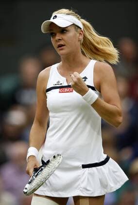 LONDON, July 2, 2013 -- Agnieszka Radwanska of Poland reacts during the quarterfinal of women s singles on day 8 of the Wimbledon Lawn Tennis Championships at the All England Lawn Tennis and Croquet Club in London, Britain on July 2, 2013. 