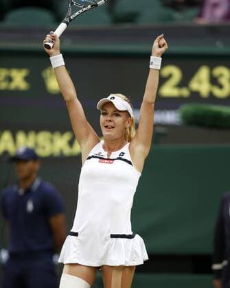 LONDON, July 2, 2013 -- Agnieszka Radwanska of Poland celebrates for victory after the quarterfinal of women s singles on day 8 of the Wimbledon Lawn Tennis Championships at the All England Lawn Tennis and Croquet Club in London, Britain on July 2, 2013. 