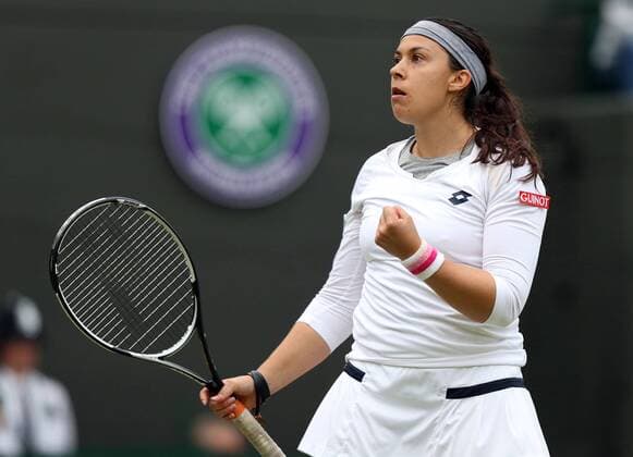 Wimbledon Championships 2013, AELTC,London, ITF Grand Slam Tennis Tournament, Marion Bartoli (FRA) macht die Faust und jubelt nach ihrem Sieg,Jubel,Emotion,Einzelbild, Halbkoerper,Querformat,