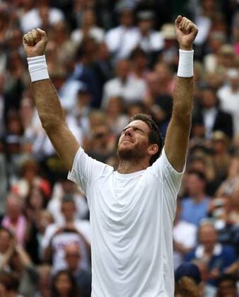 (130703) -- LONDON, July 3, 2013 (Xinhua) -- Juan Martin Del Potro of Argentina celebrates victory after the quarterfinal of men s singles on day 9 of the Wimbledon Lawn Tennis Championships at the All England Lawn Tennis and Croquet Club in London, Britain, on July 3, 2013. . (Xinhua Wang Lili) (jyc) (SP)BRITAIN-LONDON-TENNIS-WIMBLEDON-DAY 9 