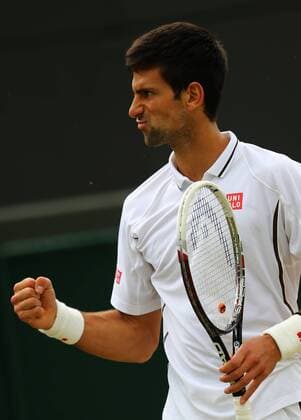 (130703) -- LONDON, July 3, 2013 (Xinhua) -- Novak Djokovic of Serbia celebrates a point during the quarterfinal of men s singles on day 9 of the Wimbledon Lawn Tennis Championships at the All England Lawn Tennis and Croquet Club in London, Britain, on July 3, 2013. (Xinhua Yin Gang) (jyc) (SP)BRITAIN-LONDON-TENNIS-WIMBLEDON-DAY 9 