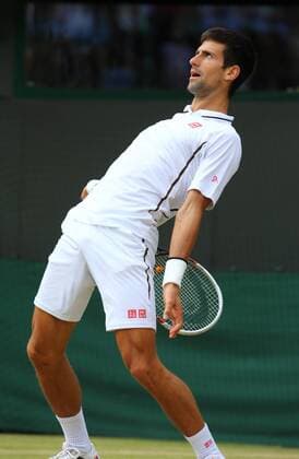 (130703) -- LONDON, July 3, 2013 (Xinhua) -- Novak Djokovic of Serbia reacts during the quarterfinal of men s singles on day 9 of the Wimbledon Lawn Tennis Championships at the All England Lawn Tennis and Croquet Club in London, Britain, on July 3, 2013. (Xinhua Yin Gang) (jyc) (SP)BRITAIN-LONDON-TENNIS-WIMBLEDON-DAY 9 