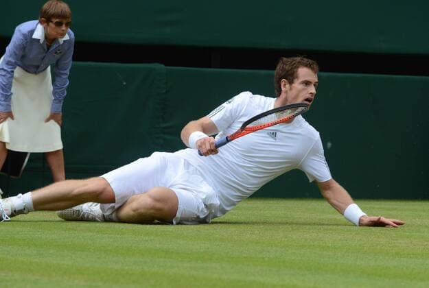 Tennis - 2013 Wimbledon Championships - Mens 1 4 Final Andy Murray slips on the grass 