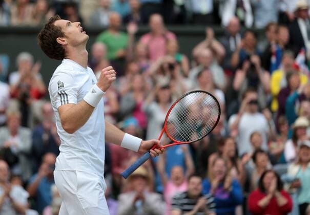 Great Britain s Andy Murray celebrates a win in his match against Spain s Fernando Verdasco on day nine of the 2013 Wimbledon Championships in London on July 03, 2013.  LON2013070305