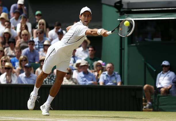 (130705) -- LONDON, July 5, 2013 (Xinhua) -- Novak Djokovic of Serbia competes during the semifinal of gentlemen s singles on day 11 of the Wimbledon Lawn Tennis Championships at the All England Lawn Tennis and Croquet Club in London, Britain on July 5, 2013. (Xinhua Wang Lili) (SP)BRITAIN-LONDON-TENNIS-WIMBLEDON-DAY 11 