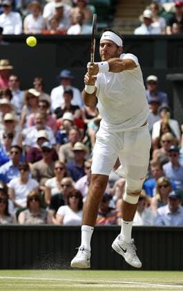 (130705) -- LONDON, July 5, 2013 (Xinhua) -- Juan Martin Del Potro of Argentina competes during the semifinal of gentlemen s singles on day 11 of the Wimbledon Lawn Tennis Championships at the All England Lawn Tennis and Croquet Club in London, Britain on July 5, 2013. (Xinhua Wang Lili) (SP)BRITAIN-LONDON-TENNIS-WIMBLEDON-DAY 11 